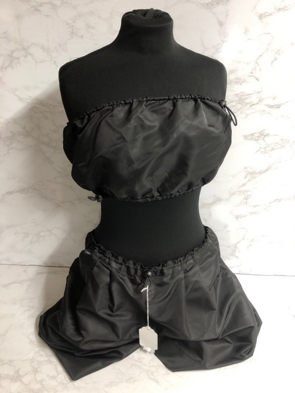 Lot 185  
            Nottingham SR5 - Delivery Only 

                
STAUD SUMMER SET IN BLACK RECYCLED NYLON SIZE:US/10 RRP:£318