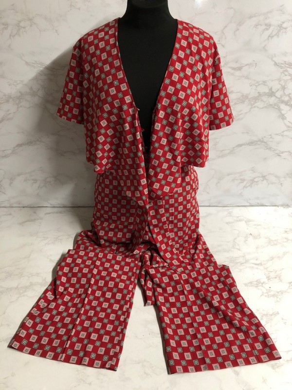 Lot 271  
            Nottingham SR5 - Delivery Only 

                
SANDRO PARIS PRINTED FLOWY JUMPSUIT IN RED POLYESTER SIZE:M RRP:£255