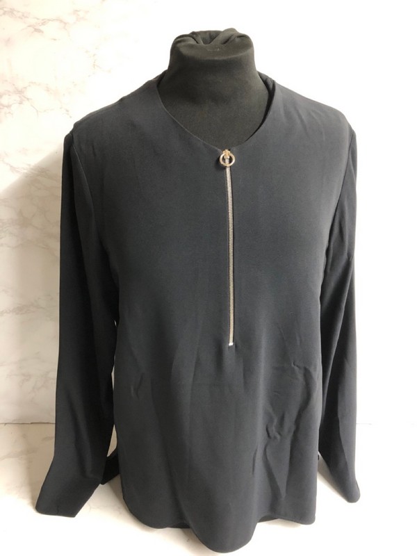 Lot 297  
            Nottingham SR5 - Delivery Only 

                
STELLA MCCARTNEY ZIPPED LONG SLEEVE TOP IN NAVY BLUE VISCOSE SIZE:IT/48 RRP:£450