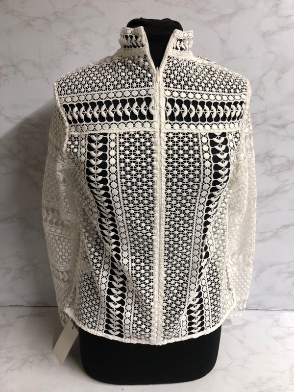 Lot 299  
            Nottingham SR5 - Delivery Only 

                
SELF PORTRAIT CROCHET LACE PANEL BLOUSE IN WHITE POLYESTER SIZE:US/6 RRP:£360