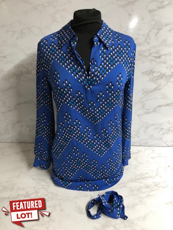 Lot 306  
            Nottingham SR5 - Delivery Only 

                
DIANE VON FURSTENBERG PATTERNED WRAP DRESS IN ELECTRIC BLUE SILK SIZE:U2/2 RRP:£518