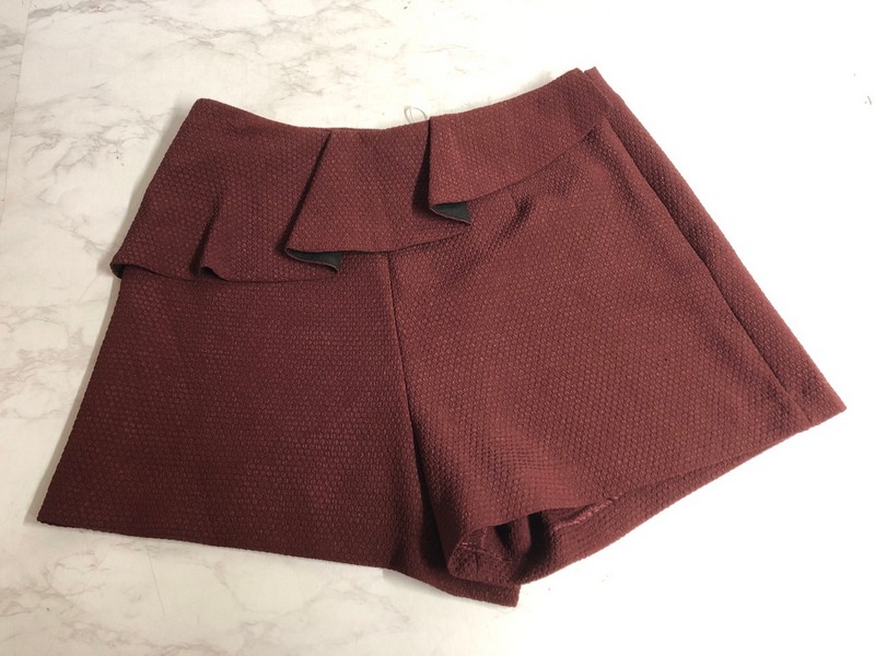 Lot 353  
            Nottingham SR5 - Delivery Only 

                
SANDRO PARIS RUFFLED TEXTURED SHORTS IN BURGUNDY POLYESTER SIZE:M RRP:£254