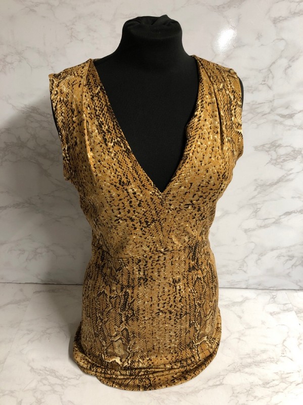 Lot 95  
            Nottingham SR5 - Delivery Only 

                
TORY BURCH SNAKE PRINT SLEEVELESS DRESS IN ANIMAL PRINTED SILK SIZE:S RRP:£200