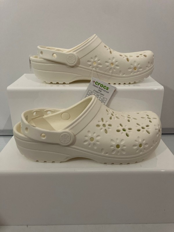 Lot 657  
            Nottingham SR7 - Delivery Only 

                
PAIR OF CROCS CLASSIC FLORAL CUT OUT CLOGS SIZE: M5 W7