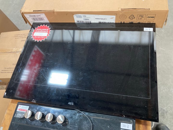 Lot 411  
            Marchington SR10 - Delivery or Collection 

                
AEG 6 BURNER INDUCTION HOB: LOCATION - A2