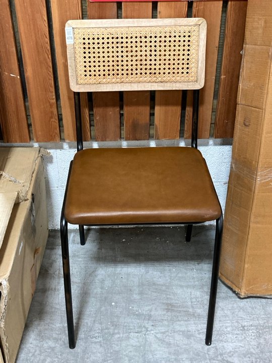 Lot 478  
            Marchington SR10 - Delivery or Collection 

                
NKUKU ISWA LEATHER & RATTAN DINING CHAIR IN TAN ORIGINAL RRP: £250: LOCATION - A2