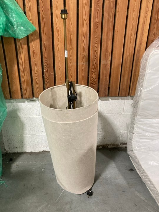 Lot 537  
            Marchington SR10 - Delivery or Collection 

                
LOAF.COM TROMBONE FLOOR LAMP IN ANTIQUE BRASS WITH SHADE IN NATURAL - ORIGINAL RR...