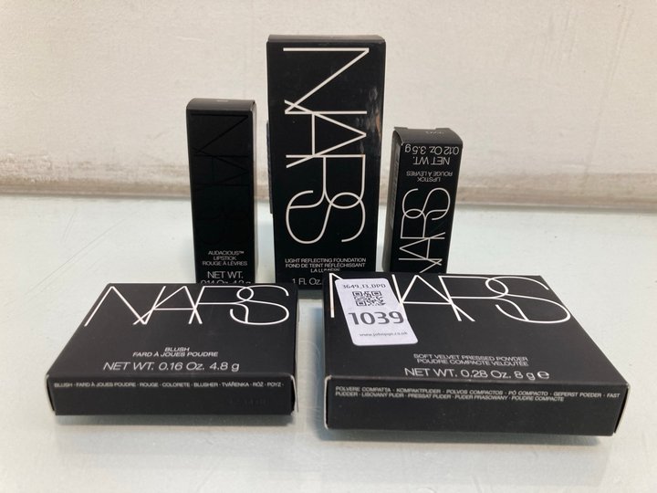 Lot 1039  
            Marchington SR13 - Parcel Delivery Only 

                
5 X ASSORTED NARS MAKE UP TO INCLUDE 4.8G BLUSH IN SHADE TEMPTED: LOCATION - G1
