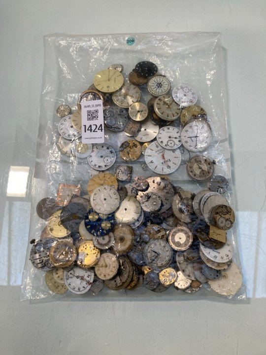 Lot 1424  
            Marchington SR13 - Parcel Delivery Only 

                
A LARGE COLLECTION OF ANTIQUE POCKET WATCH FACES AND MOVEMENTS: LOCATION - F11