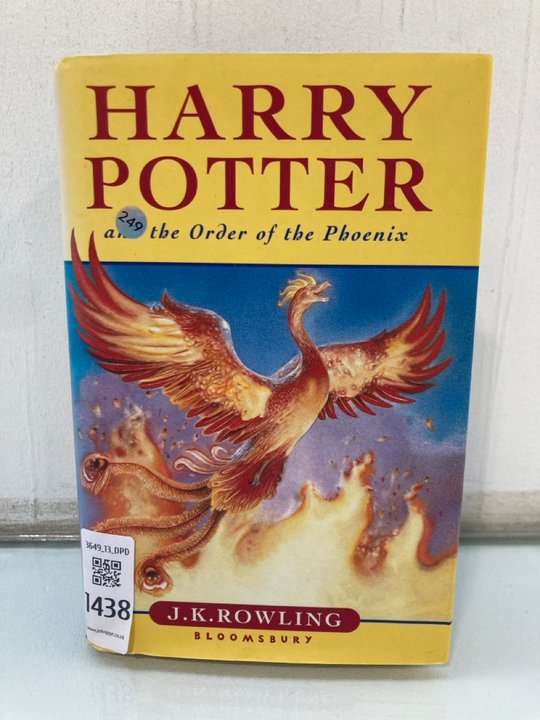 Lot 1438  
            Marchington SR13 - Parcel Delivery Only 

                
J.K. ROWLING FIRST EDITION HARDBACK BOOK WITH DUSTWRAPPER, "HARRY POTTER AND THE ...