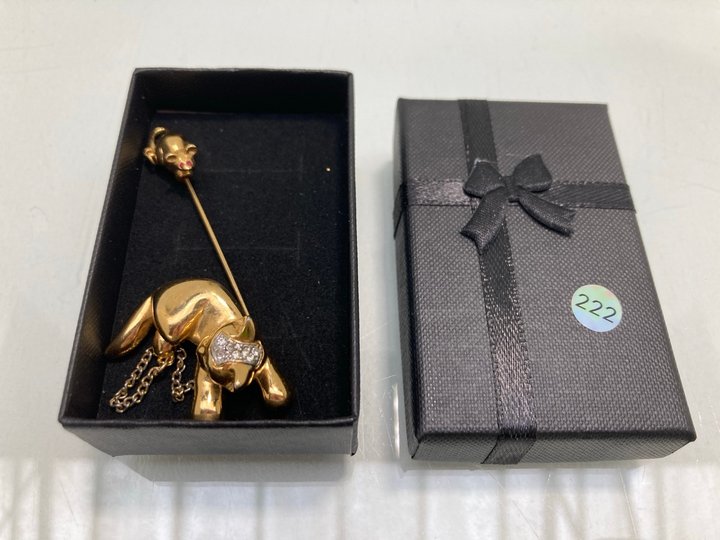 Lot 1470  
            Marchington SR13 - Parcel Delivery Only 

                
A VINTAGE GOLD COLOURED CAT AND MOUSE BROOCH SET WITH GREEN AND RED STONES, WITH ...