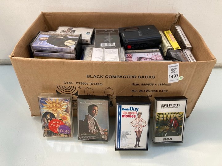 Lot 1493  
            Marchington SR13 - Parcel Delivery Only 

                
A LARGE COLLECTION OF 1980S AUDIO TAPES AND A PLAYER: LOCATION - F11