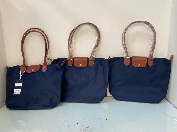 Lot 1669  
            Marchington SR13 - Parcel Delivery Only 

                
3 X CREW COMPANY CLASSIC ZIP TOP NYLON TOTE BAGS IN NAVY-ORIGINAL COMBINED RRP £1...