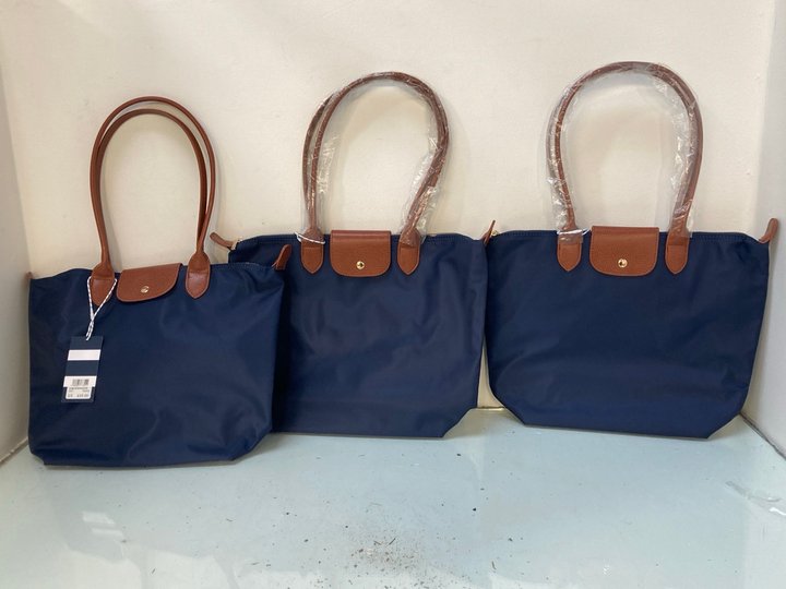 Lot 1670  
            Marchington SR13 - Parcel Delivery Only 

                
3 X CREW COMPANY CLASSIC ZIP TOP NYLON TOTE BAGS IN NAVY-ORIGINAL COMBINED RRP £1...