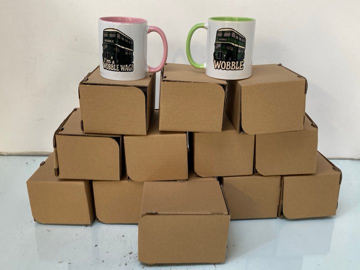Lot 1671  
            Marchington SR13 - Parcel Delivery Only 

                
QTY OF WOBBLE "I'M A WOBBLE WAG" MUGS: LOCATION - F1