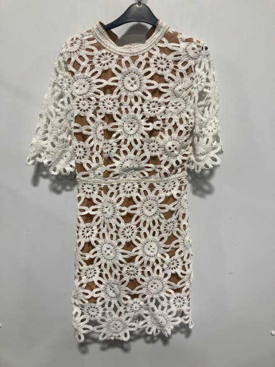 Lot 874  
            Marchington SR13 - Parcel Delivery Only 

                
ELLIATT HOT SHOT DRESS IN OFF WHITE-UK SIZE S-ORIGINAL RRP £470.00: LOCATION - H5