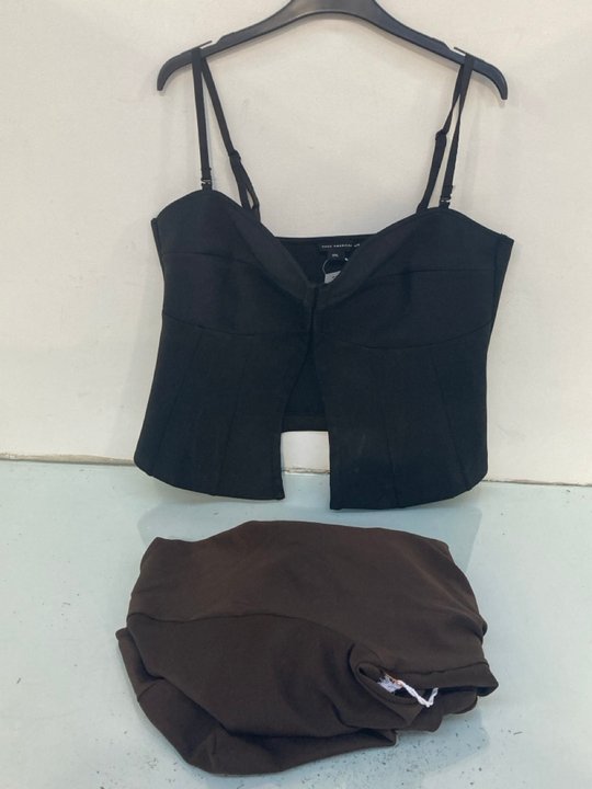 Lot 892  
            Marchington SR13 - Parcel Delivery Only 

                
GOOD AMERICAN SCUBA SCOOP LONG SLEEVE BODYSUIT IN BARK-UK SIZE 3XL TO INCLUDE GOO...