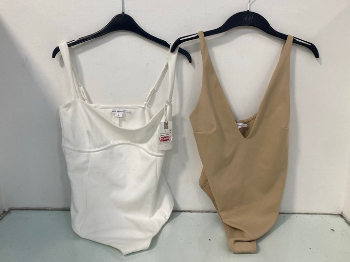 Lot 930  
            Marchington SR13 - Parcel Delivery Only 

                
2 X GOOD AMERICAN SCUBA V TANK BODIES IN NATURAL/WHITE-UK SIZE XL -ORIGINAL COMBI...