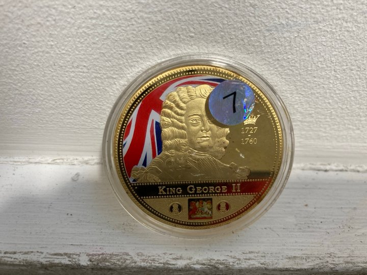 Lot 939  
            Marchington SR13 - Parcel Delivery Only 

                
A 24 CARAT GOLD PLATED COMMEMORATIVE COIN, "KINGS AND QUEENS OF BRITAIN SINCE 170...