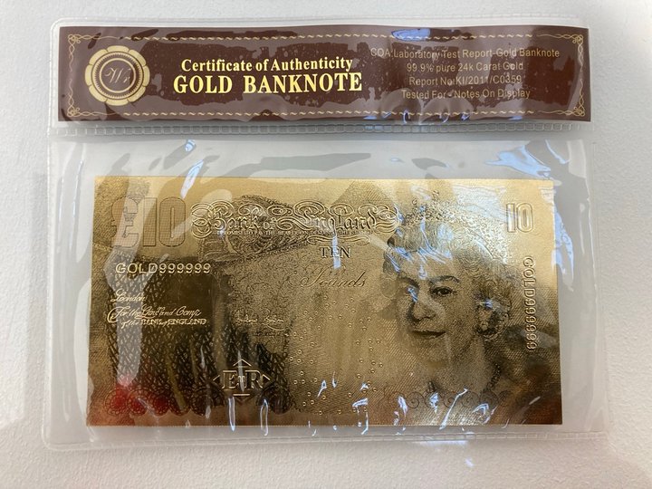 Lot 940  
            Marchington SR13 - Parcel Delivery Only 

                
A 24 CARAT BRITISH BANKNOTE, £10 (WITH LABORATORY TEST REPORT CERTIFICATE OF AUTH...