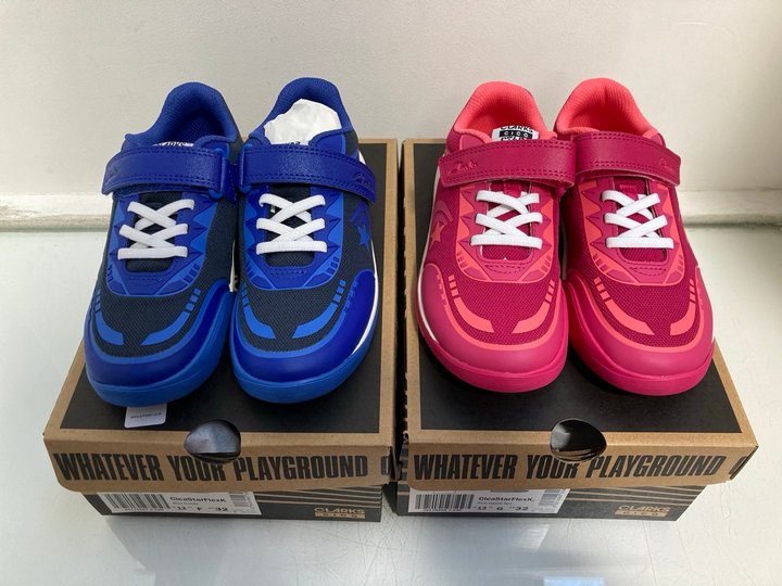 Lot 961  
            Marchington SR13 - Parcel Delivery Only 

                
2 X PAIRS OF CLARKS CHILDRENS CIA STAR FLEX TRAINERS IN BLUE COMBI AND PINK COMBI...