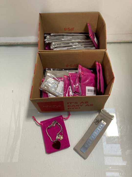 Lot 978  
            Marchington SR13 - Parcel Delivery Only 

                
QTY OF GRANDDAUGHTER CHARMS BRACELETS IN SILVER TO INCLUDE QTY OF 70TH BIRTHDAY F...