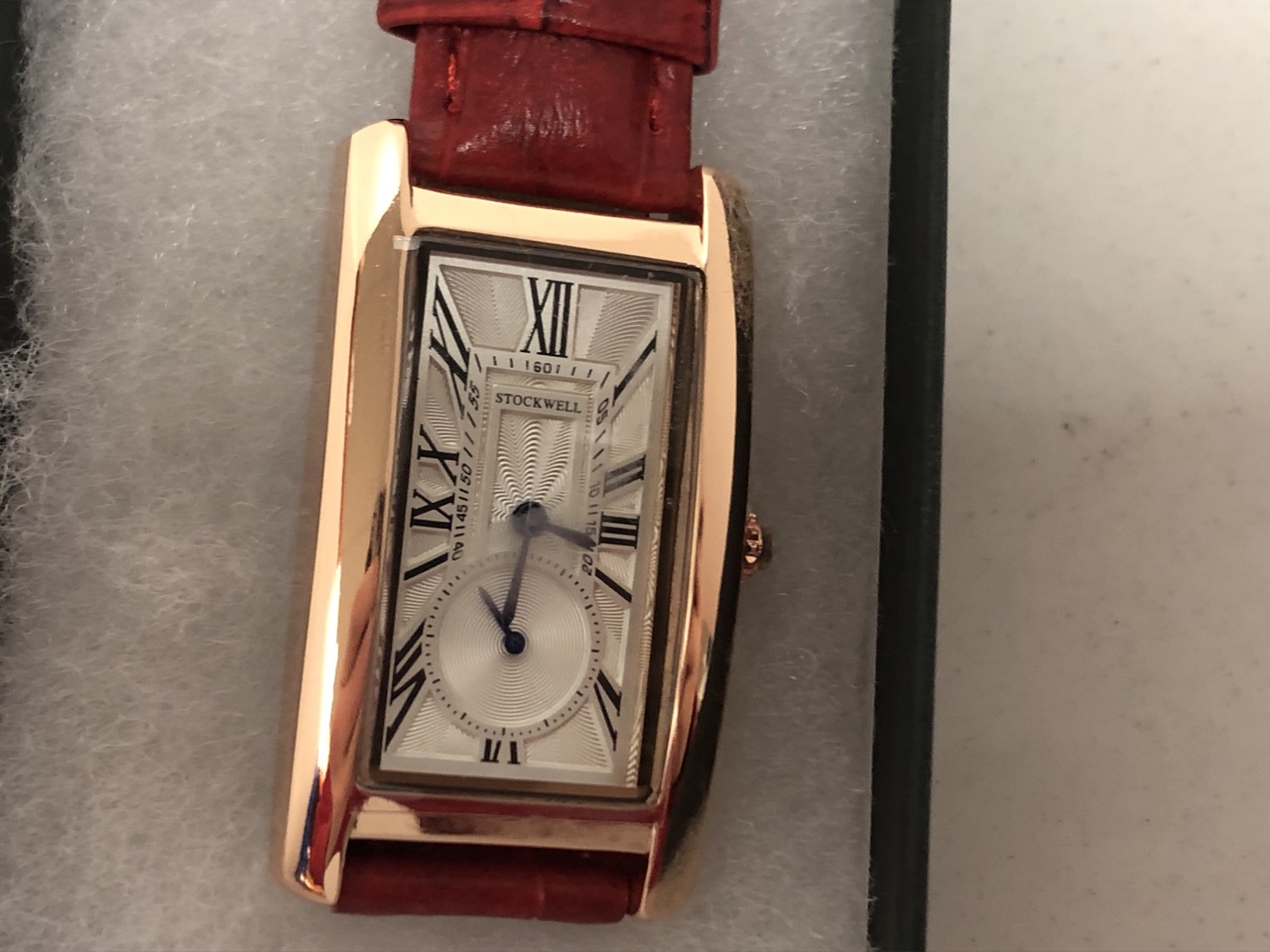 Lot 43  
            Edinburgh SR34 - Delivery Only 

                
STOCKWELL RED LEATHER STRAP WATCH WITH WHITE FACE & BRONZE OUTLINE: LOCATION - TO...