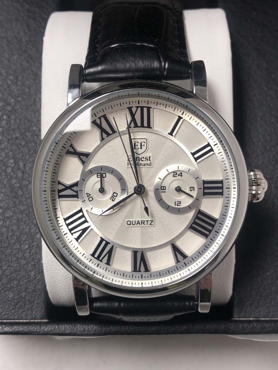 Lot 596  
            Edinburgh SR34 - Delivery Only 

                
ERNEST FERDINAND QUARTZ STAINLESS STEEL LEATHER STRAPPED WATCH.: LOCATION - H