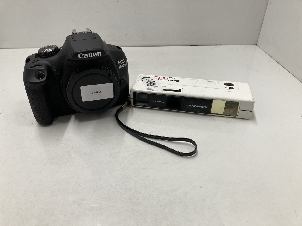 Lot 108  
            Edinburgh SR33 - Delivery Only 

                
QUANTITY OF TECH  ITEM TO INCLUDE CANON CAMERA + HANIMEX CAMERA : LOCATION - B