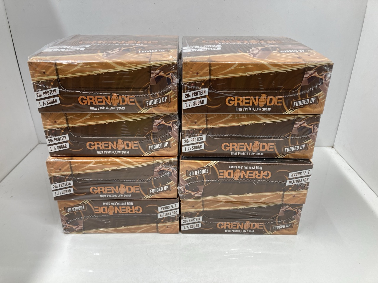 Lot 185  
            Edinburgh SR33 - Delivery Only 

                
8 X GRENADE HIGH PROTEIN, LOW SUGAR BAR - FUDGED UP, 12 X 60 G (PACKAGING MAY VAR...