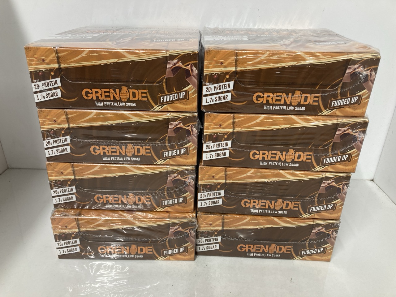 Lot 192  
            Edinburgh SR33 - Delivery Only 

                
8 X GRENADE HIGH PROTEIN, LOW SUGAR BAR - FUDGED UP, 12 X 60 G (PACKAGING MAY VAR...