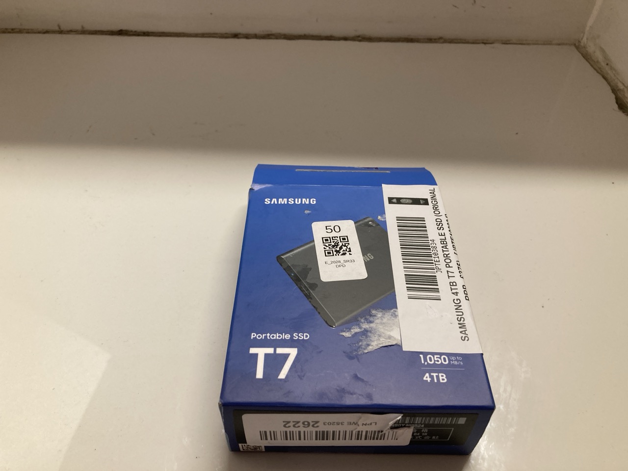 Lot 50  
            Edinburgh SR33 - Delivery Only 

                
SAMSUNG 4TB T7 PORTABLE SSD (ORIGINAL RRP - £375).  [JPTE103834] : LOCATION - TOP 50