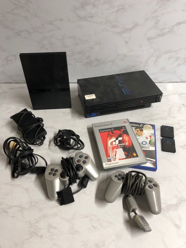 Lot 24  
            Nottingham SR5 - Delivery Only 

                
2 X RETRO SONY PLAYSTATION 2 CONSOLES + ACCESSORIES