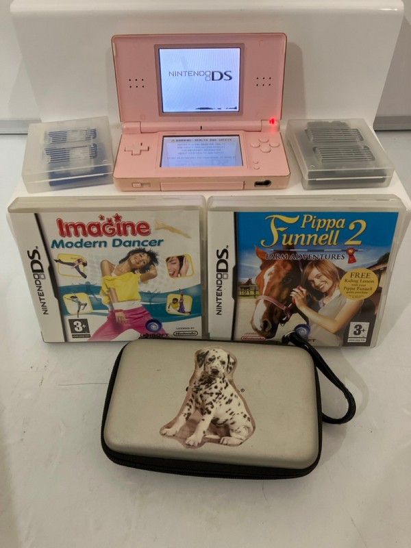 Lot 59  
            Nottingham SR6 - Delivery Only 

                
NINTENDO DS GAME IN PINK WITH GAMES TO INC IMAGINE MODERN DANCER