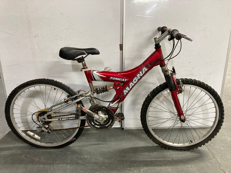 Lot 153  
            Nottingham SR6 - Collection Only 

                
MAGNA TOMCAT RED FRAME PEDAL BICYCLE (MPSS02391602) (COLLECTION ONLY)