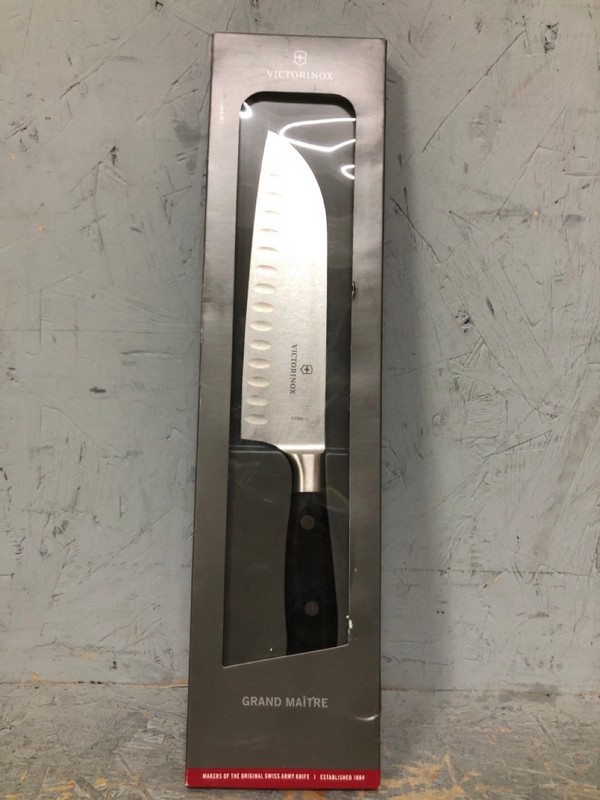 Lot 92  
            Nottingham SR6 - Collection Only 

                
VICTORINOX GRAND MAITRE CHEF'S KNIFE (18+ ID MAY BE REQUIRED - COLLECTION ONLY)