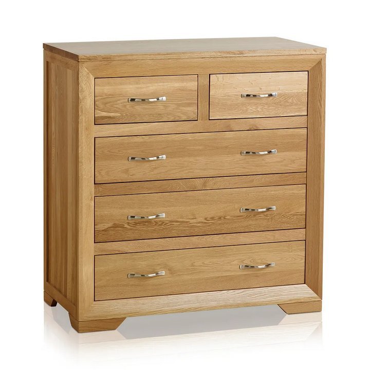 Lot 9  
            Marchington SR10 - Delivery or Collection 

                
OAK FURNITURELAND BEVEL NATURAL SOLID OAK 5 DRAWER CHEST - ORIGINAL RRP £469.99: ...