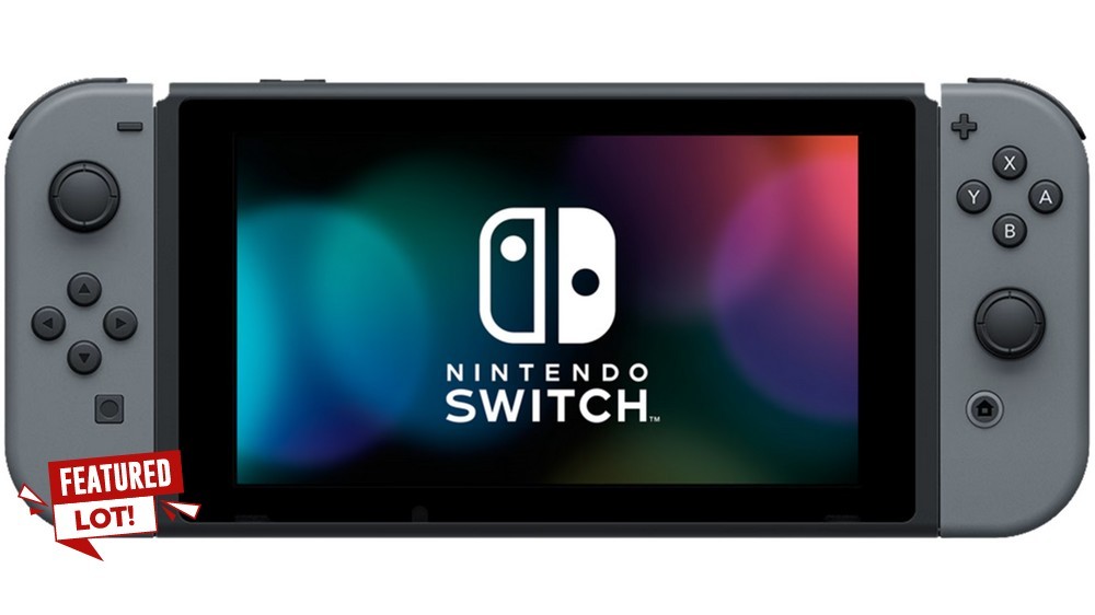 Lot 225  
            Chesterfield Tech - Parcel Delivery Only 

                
NINTENDO SWITCH GAMES CONSOLE (ORIGINAL RRP - £199.99) IN GREY. (WITH CASE) [JPTC...