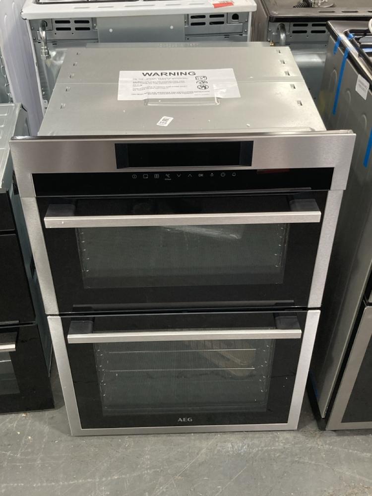 Lot 103  
            Chesterfield SR39 - Collection or Optional Delivery Available 

                
AEG BUILT IN DOUBLE ELECTRIC OVEN IN STAINLESS STEEL MODEL: DCE731110M ORIGINAL R...