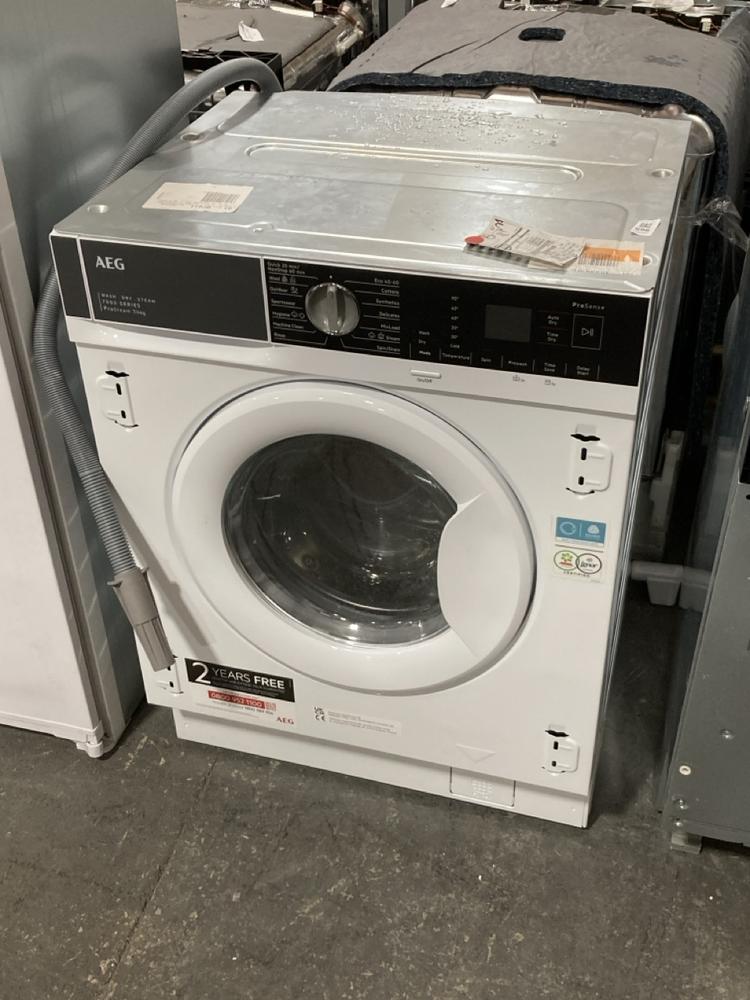 Lot 696  
            Chesterfield SR39 - Collection or Optional Delivery Available 

                
AEG 7000 SERIES WASHER DRYER IN WHITE MODEL: LTWE74634BI ORIGINAL RRP- £679 (LOCA...