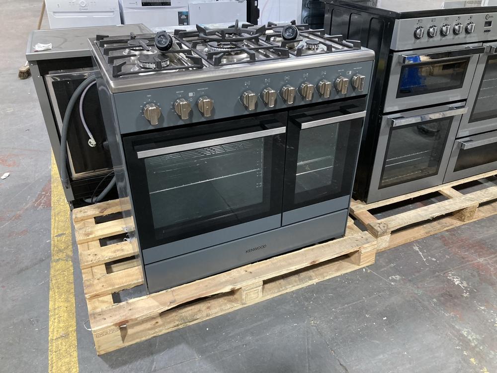 Lot 702  
            Chesterfield SR39 - Collection or Optional Delivery Available 

                
KENWOOD DOUBLE OVEN DUAL FUEL COOKER IN SILVER MODEL: CK600 ORIGINAL RRP- £959 (L...
