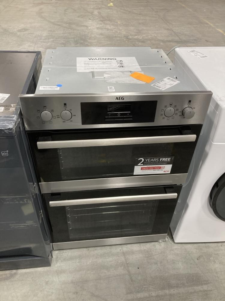 Lot 1155  
            Chesterfield SR38 - Collection or Optional Delivery Available 

                
AEG BUILT IN DOUBLE ELECTRIC OVEN - MODEL NO. DCB331010M - ORIGINAL RRP £593 (LOC...