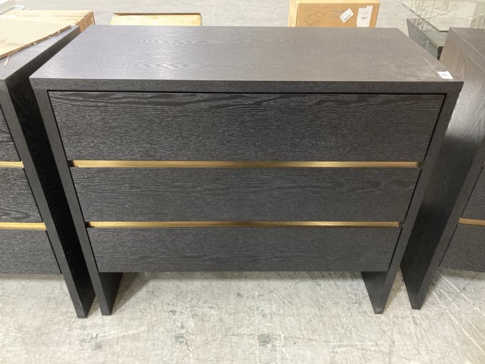 Lot 547  
            Chesterfield SR38 - Collection or Optional Delivery Available 

                
DFS 3 DRAWER CHEST OF DRAWERS IN BLACK ASH / BRASS (LOCATION: SR38 B4)