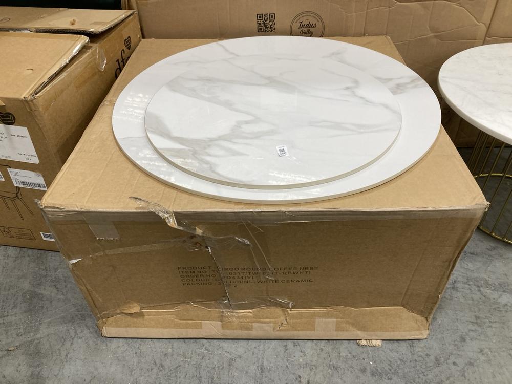 Lot 556  
            Chesterfield SR38 - Collection 

                
DFS ROUND NESTING COFFEE TABLES IN GOLD / BINLI WHITE CERAMIC (COLLECTION ONLY) (...