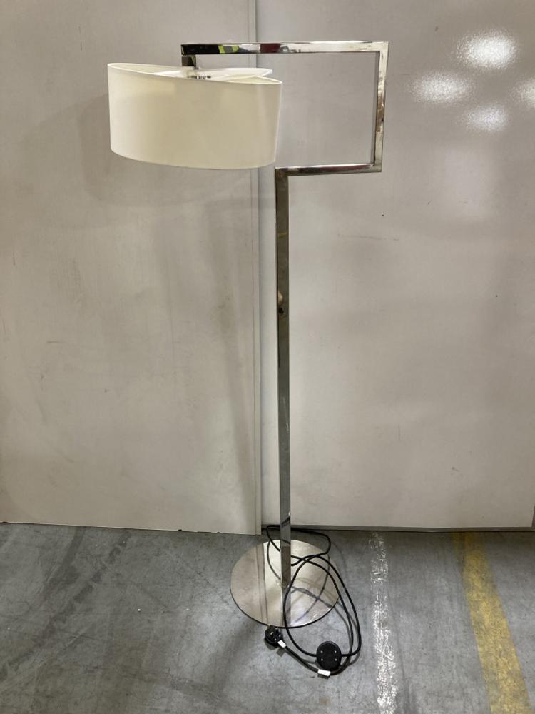 Lot 71  
            Chesterfield SR38 - Collection 

                
DFS ROUND BASE FLOOR LAMP IN CHROME WITH OFF WHITE LAMP SHADE - ORIGINAL RRP £478...