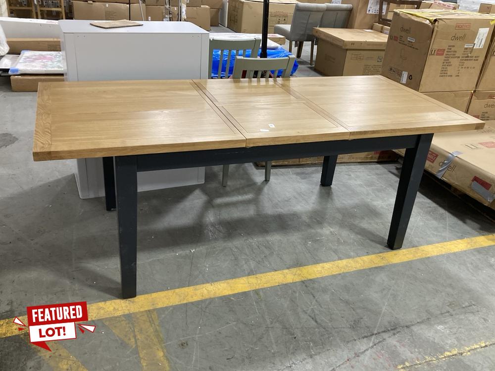Lot 786  
            Chesterfield SR38 - Collection or Optional Delivery Available 

                
DFS EXTENDING DINING TABLE IN NATURAL WOOD / DARK GREY LEGS (LOCATION: SR38 A6)