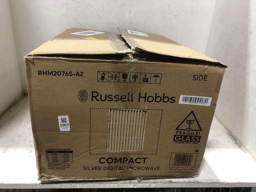 Lot 1007  
            Chesterfield SR45 - Parcel Delivery Only 

                
RUSSEL HOBBS COMPACT SILVER DIGITAL MICROWAVE RHM2076S-AZ (LOCATION: D8)