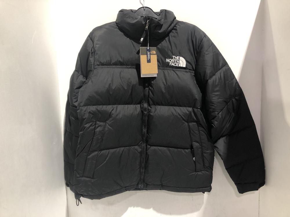 Lot 1346  
            Chesterfield SR45 - Parcel Delivery Only 

                
THE NORTH FACE MENS 1996 RETRO NUPTSE JACKET IN BLACK SIZE M ORIGINAL RRP £315 (L...