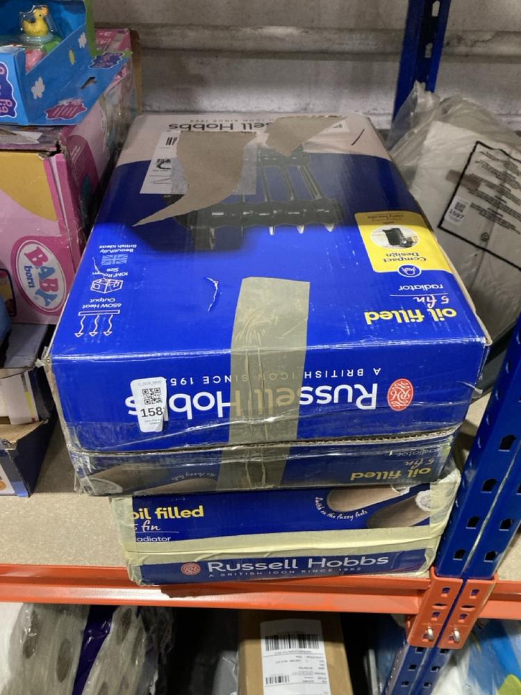 Lot 1583  
            Chesterfield SR45 - Parcel Delivery Only 

                
2X RUSSELL HOBS 5 FIN OIL FILLED RADIATOR (LOCATION: A3)