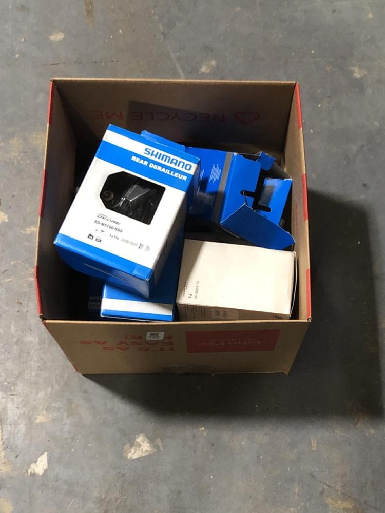 Lot 430  
            Chesterfield SR45 - Parcel Delivery Only 

                
BOX OF ASSORTE BIKE PARTS TO INCLUDE SHIMANO CUBES SHIFT LEAVER SL-U4000-9R (LOCA...